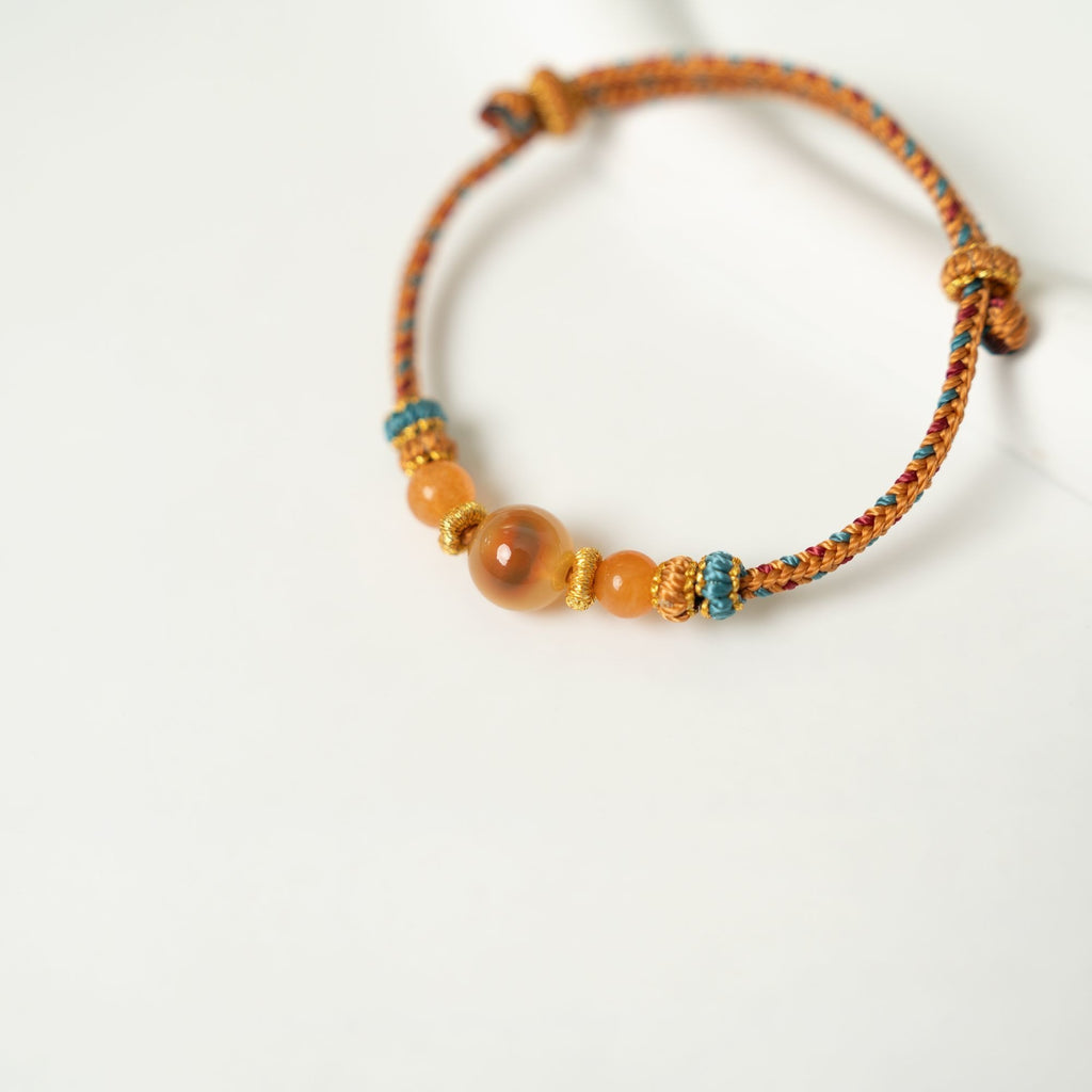Dunhuang Amber Glow – Handmade Yellow String Bracelet