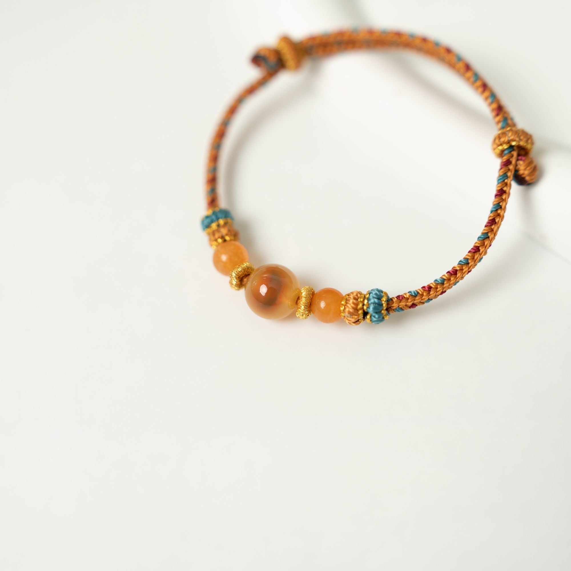 Dunhuang Amber Glow – Handmade Yellow String Bracelet