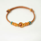 Dunhuang Amber Glow – Handmade Yellow String Bracelet